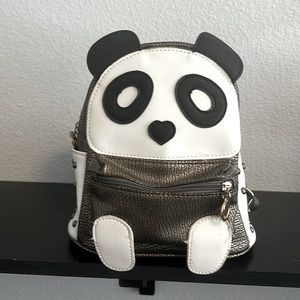Medium gold, black, and white panda backpack purse.